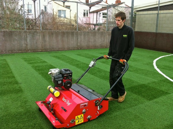 Synthetic Turf Management maintaining grass surface